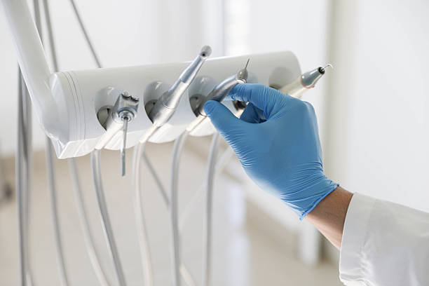 Professional Tooth Extraction technician working in Midway, NC